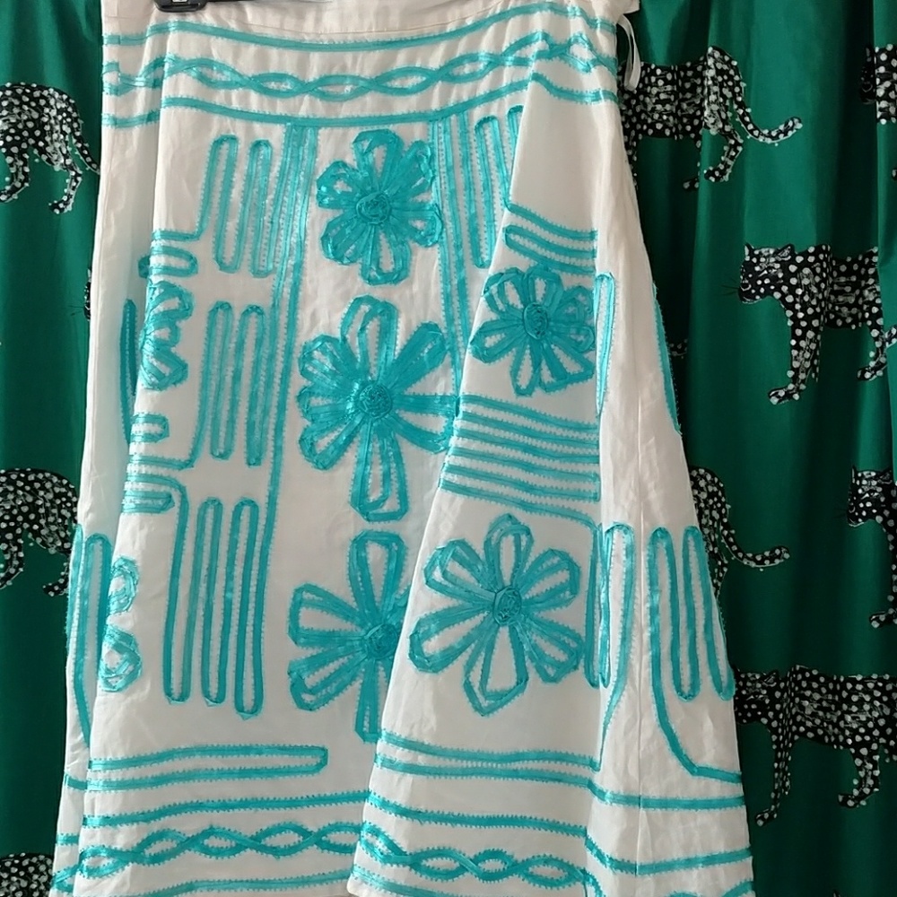 White linen skirt with turquoise ribbon detail